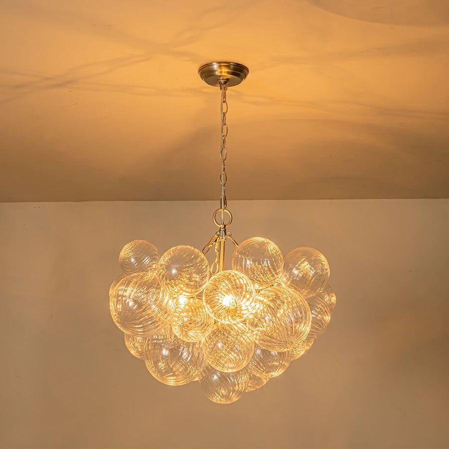 Lustre globo de vidro com nervuras Glissair em latão